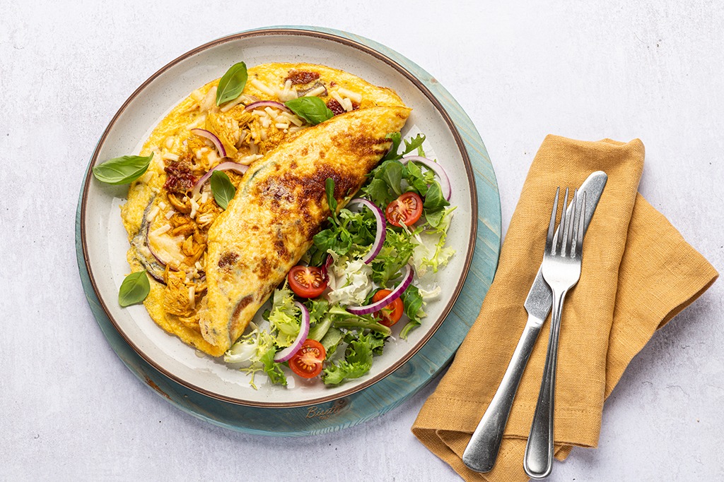 Read more about the article KAREN’S SPICY CHICKEN & GRATED MATURE CHEDDER OMELETTE